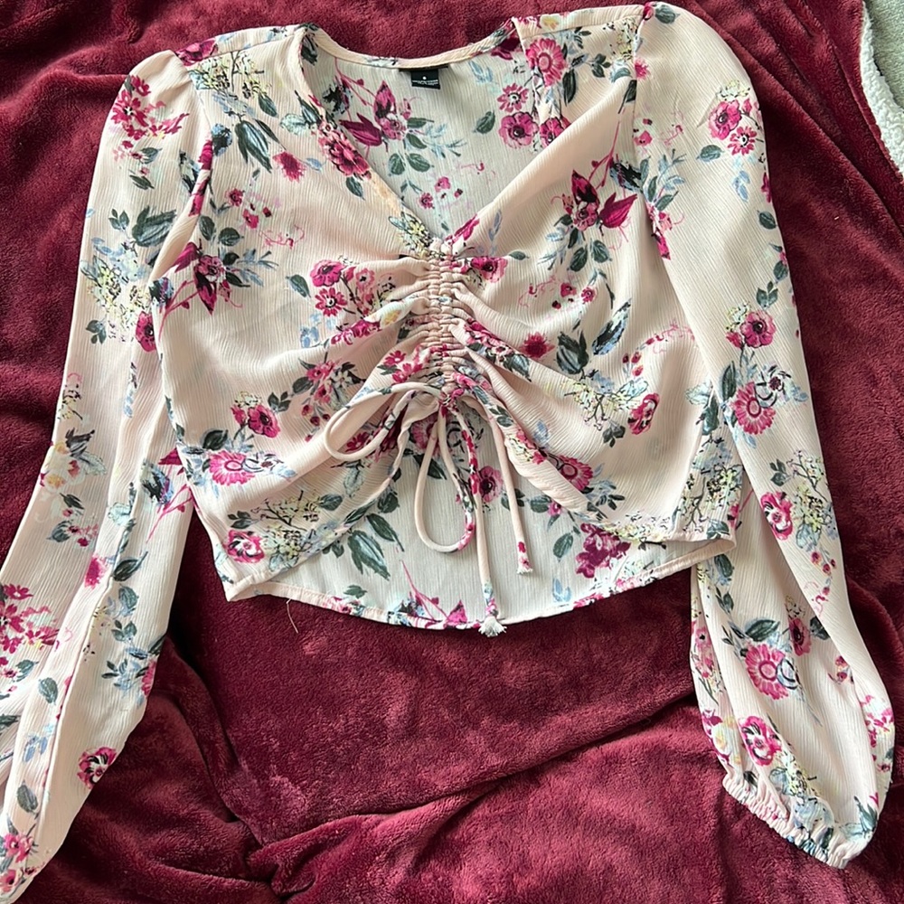 Color-Pink with floral design.  Size Small